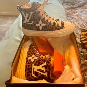 Louis Vuitton high top sneakers, worn a few times and are like new